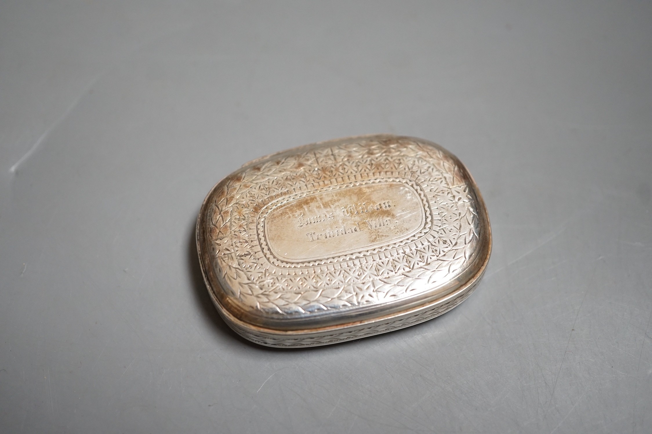 A Victorian Scottish silver oval vesta case, John Muirhead & Son, Glasgow, 1869, with engraved inscription and cover with hunting dog and game bird, 58mm.